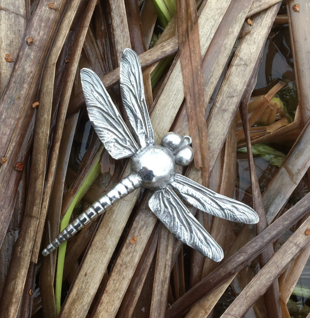 Rund bild med silverslända